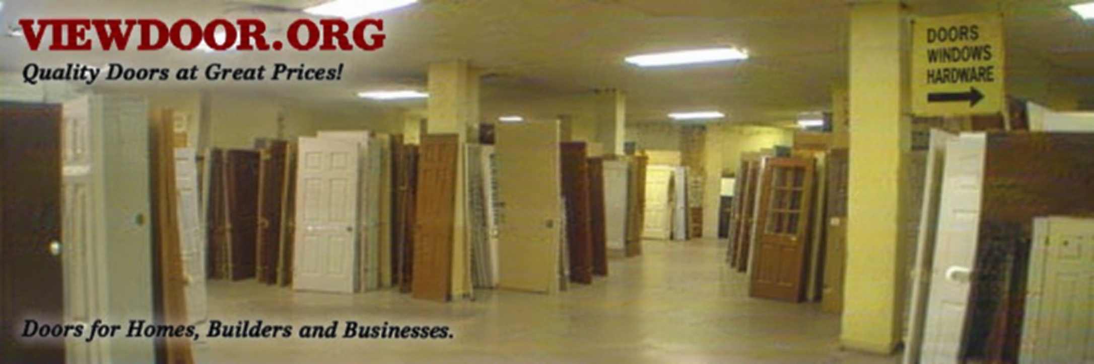 A low quality photograph of a strange warehouse full of doors